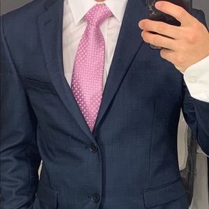 I am selling my navy blue graduation suit.